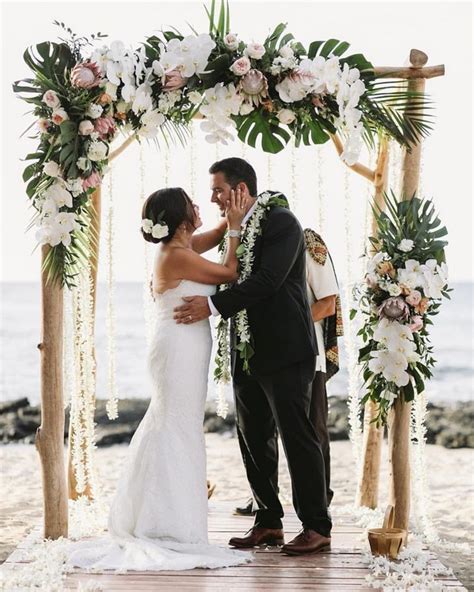 Tropical Wedding Arch With Gilded Monstera Leaves White Orchids And