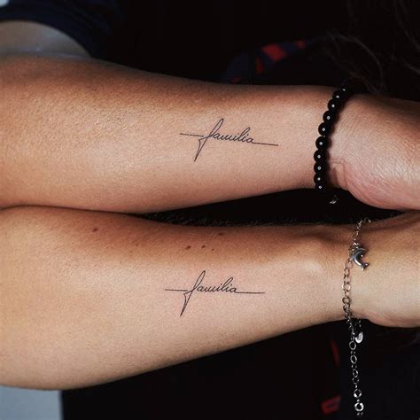 Familia Lettering Tattoo For Mother And Daughter