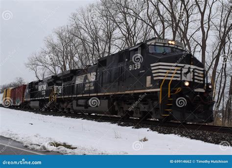 Norfolk Southern Train Traveling Through Snow Editorial Photography