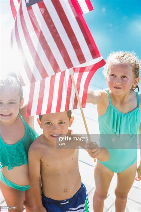 Multiethnic Children Holding American Flags High Res Stock Photo