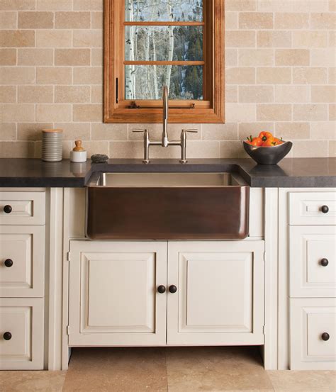 Modern cabinets, classic white subway tile on the backsplash, and weathered. Copper/Stainless Farmhouse Sink | Architonic