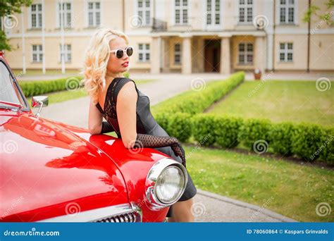 Woman With Sunglasses Leaning Against Red Retro Car Stock Photo Image