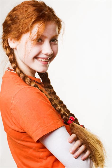 Premium Photo Picture Of Lovely Redhead Girl With Long Braids
