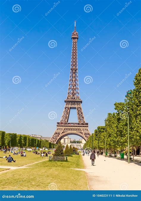 Eiffel Tower In Paris With Grass Lawn And People Paris Editorial