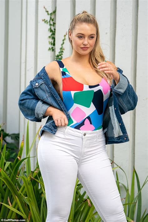 iskra lawrence shows off her famous curves in a colourful bodysuit during miami photoshoot