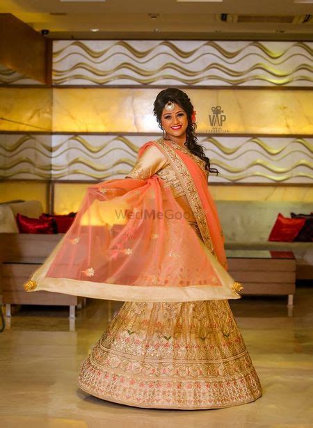 Photo Of Cute Bride In Jeans And Red Lehenga
