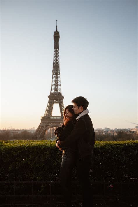 Couple Holding By The Eiffel Tower At Sunrise In 2021 Paris Tour