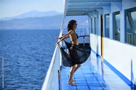 Sexy Lady Walk On Deck Of Cruise Liner With Sea On Background Woman In