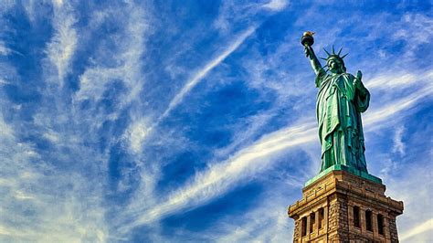 the beautiful statue of liberty monument statue clouds sky lady hd wallpaper peakpx