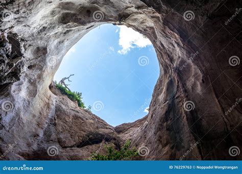 Large Hole In Rocky Cave With Blue Sky Stock Image Image Of Group