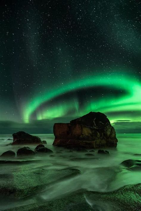 Aurora Borealis Over Uttakleiv Beach Vestvågøy Norway By Ajit Menon