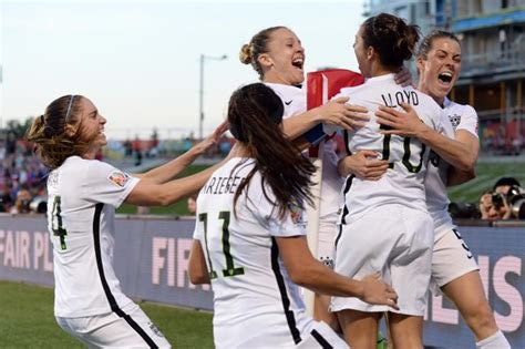Carli Lloyd Is Congratulated By Her Us Teammates After Scoring The