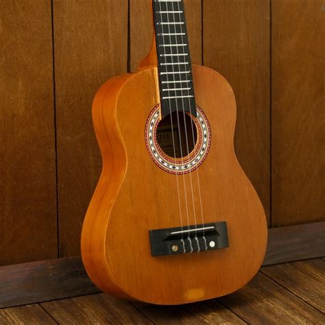 Музыкальный инструмент гитара-укулеле 