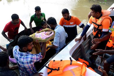 Navy Personnel Deployed To Rescue Flood Victims In North