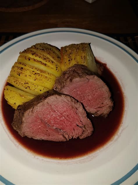 Let rest before thinly slicing. HomemadeBeef tenderloin pan fried and finished in oven, served with hasselback potatoes and ...