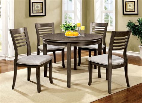 Dining sets are available in all shapes sizes heights and materials and typically include the table and at least four chairs. Dwight III Gray 48" Round Dining Room Set from Furniture of America | Coleman Furniture