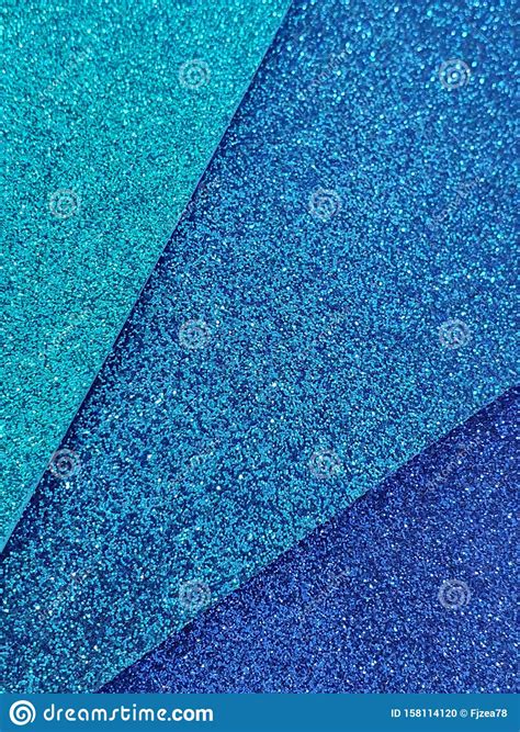 Closeup Of Stacked Foamy Sheets In Metallic Blue Colors Background And