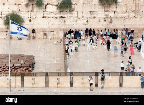 People Gather Throughout The Day To Pray At The Western Wall Also