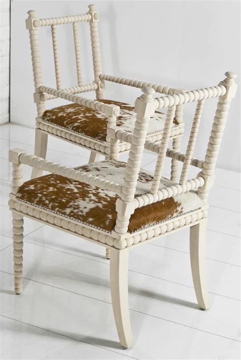 This chair is not only comfortable to sit in, but it has an elegant look to it that just screams perfect for dinner parties. www.roomservicestore.com - Acapulco Cowhide Dining Chair