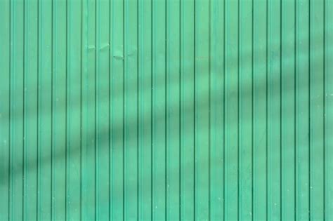 Premium Photo Green Corrugated Metal Roof With Shadow