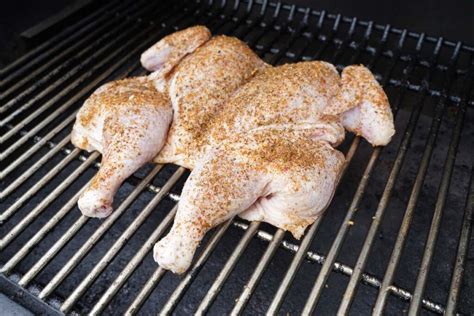 smoked spatchcock chicken couple in the kitchen