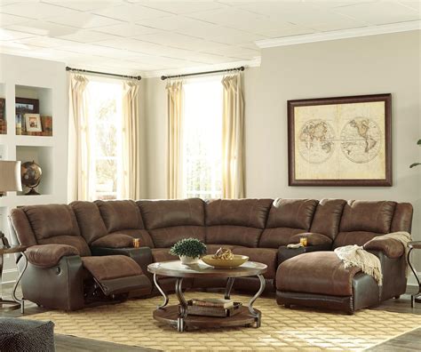 Nevaeh Faux Leather Reclining Sectional With 2 Consoles And Chaise Ruby