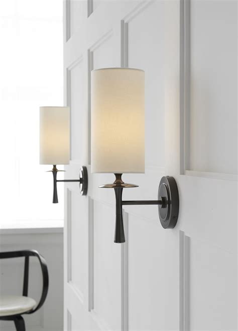 Bathroom vanity sconces is the main hub of a bathroom and often requires a lot of light around the sink and mirror area. Drunmore Single Sconce | Sconces living room, Sconces, Lights