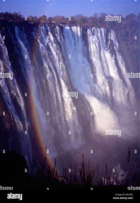 A Circular Rainbow Around The Main Falls At Victoria Falls Stock Photo