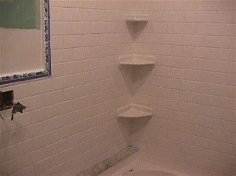 How to mount corner shelves in the shower? Installing a corner shower shelf - Ceramic Tile Advice ...