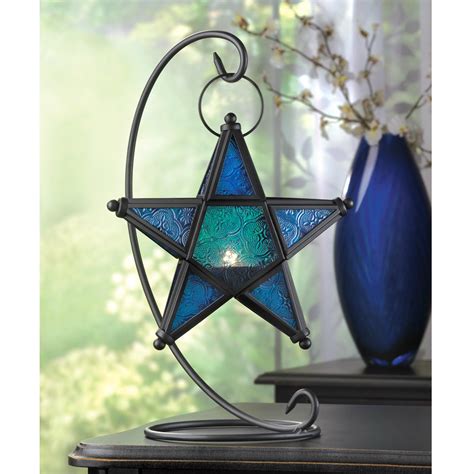 Rustic metal outdoor candle lanterns candles inside oil lamps metal lantern image metal lanterns glass lantern candle lanterns. Blue Glass Hanging Star Candle Lantern