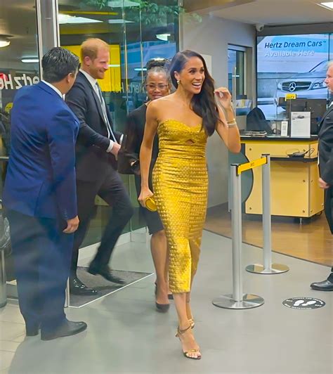 Meghan Markle Wears Gold Dress For Women Of Vision Gala Alongside