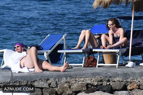 Lily Collins Sexy On The Beach In Ischia Aznude