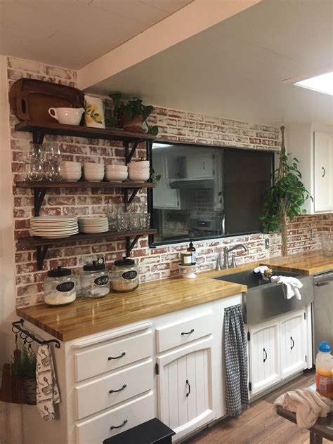 I believe you can get them at home depot too. Farmhouse kitchen with faux brick backsplash | 1000 in ...