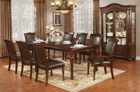 The 5 piece dining set transitional style and modest scale make it the perfect addition to your cozy dining space. Sylvana Brown Cherry Dining Room Set - 1StopBedrooms.