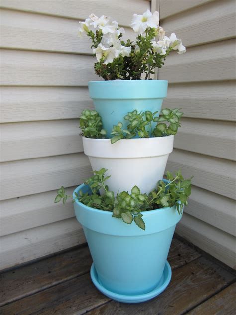 Flowering plants make beautiful gifts, but not all are created equal. stacked flower pots. I wish I could make this | Stacked ...