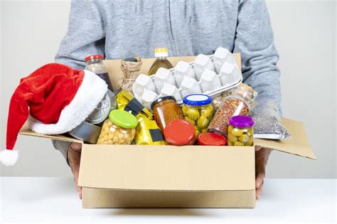 Christmas Donation Box Food Donations On Light Background With