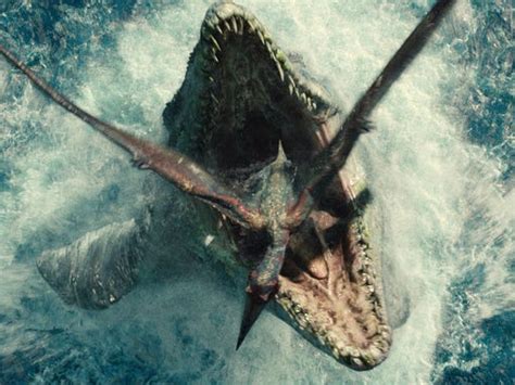 A Mosasaurus Emerges From The Water To Chomp On Its