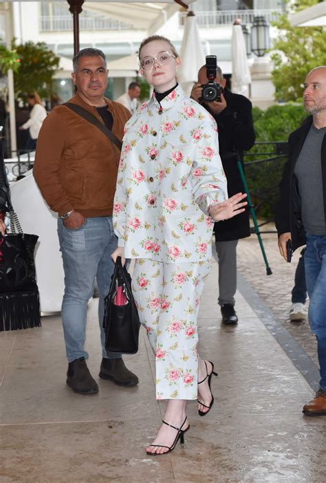 Elle Fanning In A White Floral Suit Was Seen Out In Cannes 05182019 5