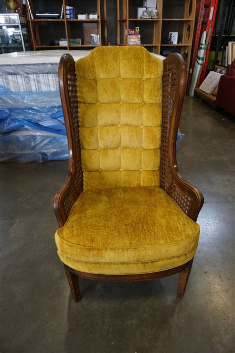 Collection by steve ocholi • last updated 12 weeks ago. UPHOLSTERED RATTAN WING BACK ARM CHAIR - Big Valley Auction
