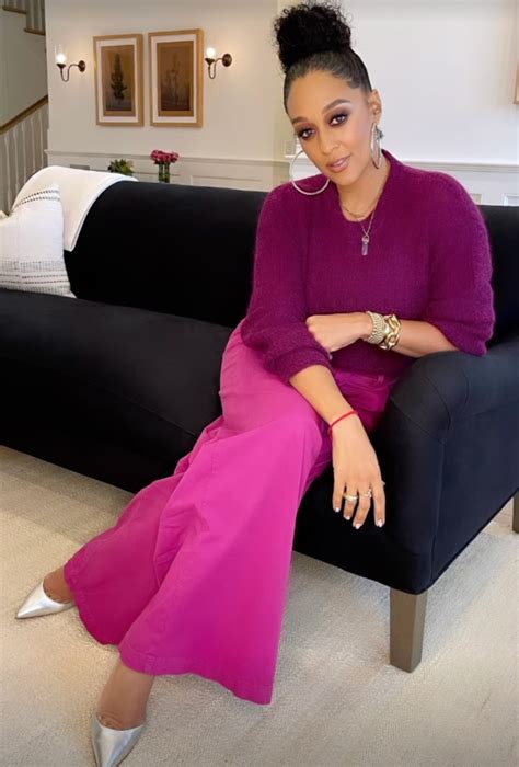 Tia Mowry Styles Her Favorite Color In Purple Sweater Metallic Pumps