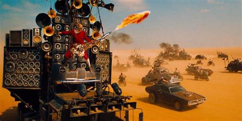 The Story Behind Mad Max Fury Road S Flamethrower Guitarist