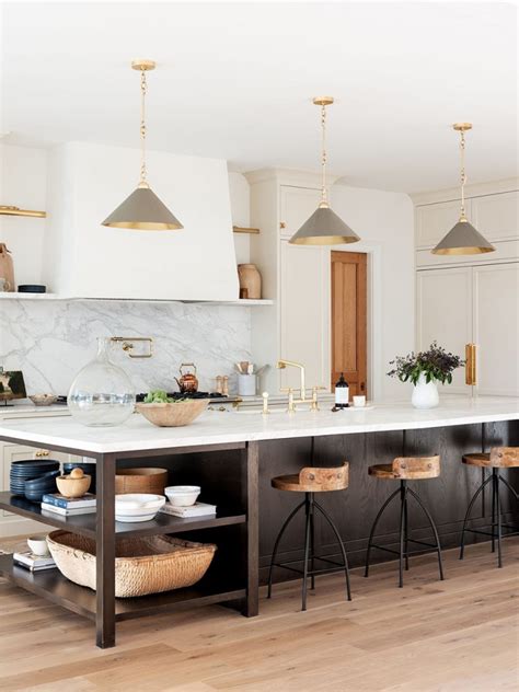 Some kitchen islands are stationary for a secure workspace, while some islands come with casters so they can be moved easily when necessary. These Kitchen Islands with Storage and Seating Are the ...