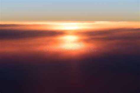Beautiful Sunset Or Sunrise Above Clouds From Airplane Perspective