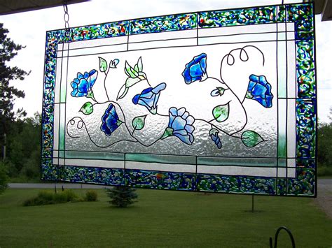 Faux Stained Glass On Plexiglas Using Peel And Stick Lead And Hand Painting With Glass Paints