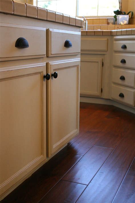 You should sand cabinets before beginning your how to paint kitchen cabinet project to give the new paint a good surface to grip. Kitchen Cabinets painted with Old Ochre Chalk Paint ...