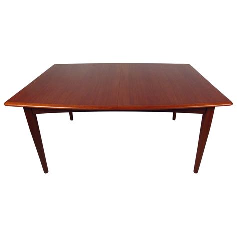 As much as the name may sound. Danish Modern Butterfly Leaf Dining Table at 1stDibs
