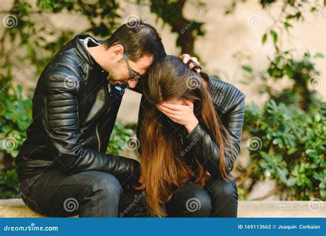 Caring Husband Comforting To Wife Giving Her Psychological Support