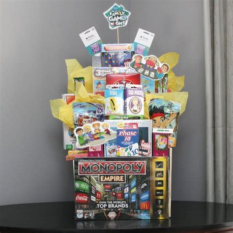 Pin By Caroline Arroyo On Game Night Silent Auction Baskets Game