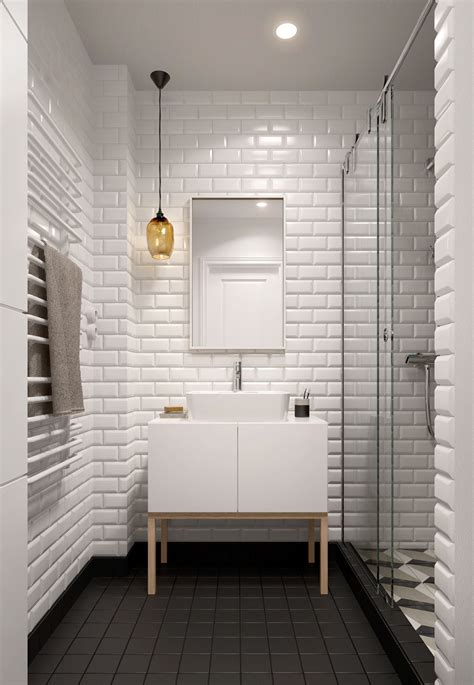 Vertical white tile pops against the surrounding black bathroom walls, chrome fixtures, and provides an interesting line of demarcation for the shower stall. A Midcentury Inspired Apartment with Scandinavian Tendencies