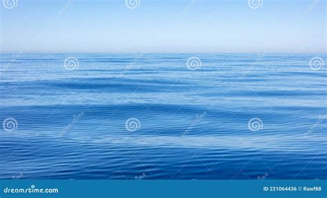 Sea Water Surface Calm With Small Ripples Still Ocean Deep Blue Color
